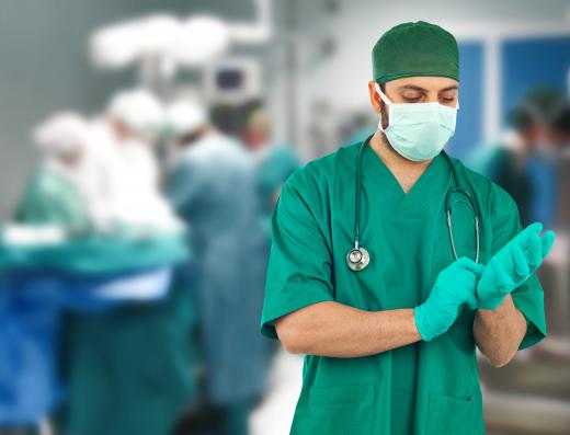 A colorectal surgeon performs surgery on the colon.