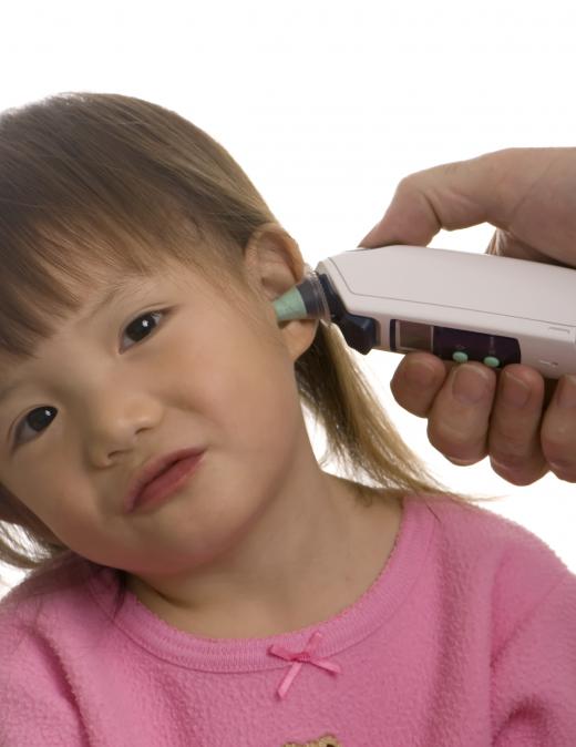 Pediatric nurses check children's vital signs.