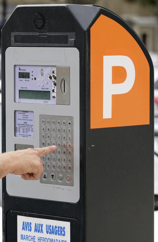 Parking attendants may be responsible for checking parking meters.