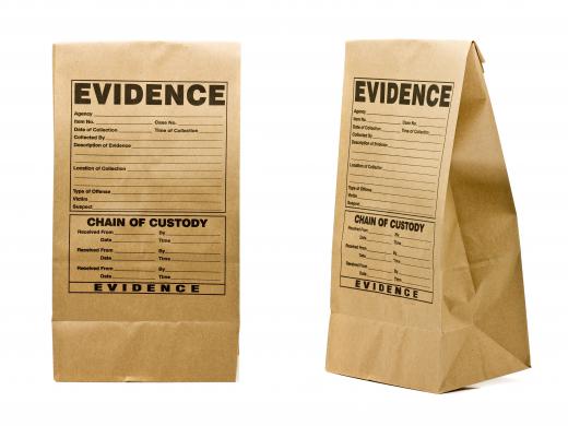 Evidence technicians are responsible for bagging evidence at a crime scene.