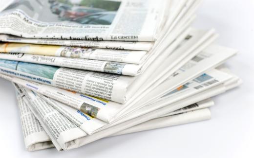 Most newspapers today are laid out using computer programs.