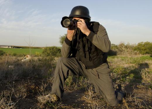 A documentary photographer might work in a war zone.