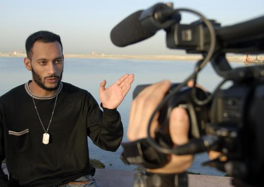 A TV news anchor introduces stories presented by field reporters.