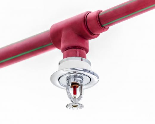 A fire technician may help map out places to install fire sprinkler systems.