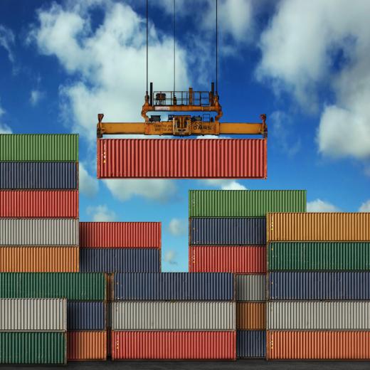 Longshoremen may be tasked with using cranes to move intermodal containers.