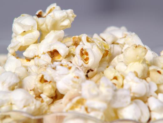 Confectioners at amusement parks often sell popcorn and other snacks.