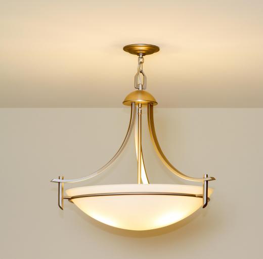 Installing decorative light fixtures is one part of interior design.