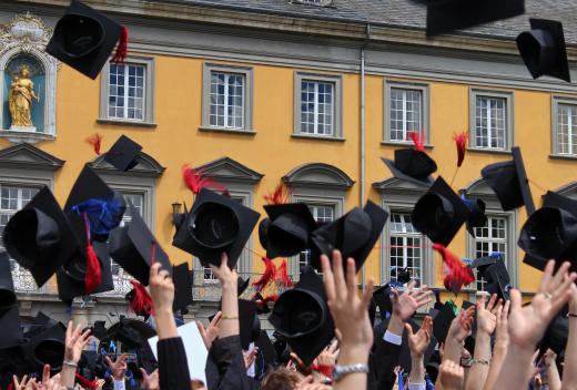 Students may receive diplomas at graduation ceremonies.