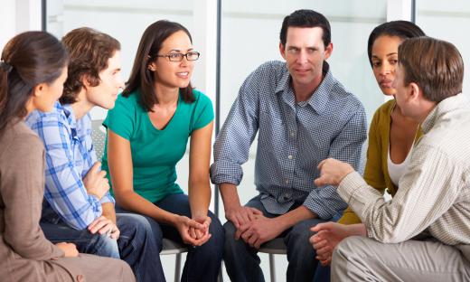 A clinical psychiatrist may help facilitate group therapy sessions.