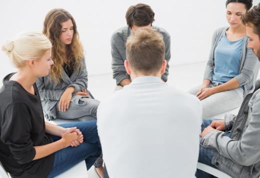 A movement therapist may conduct group sessions.