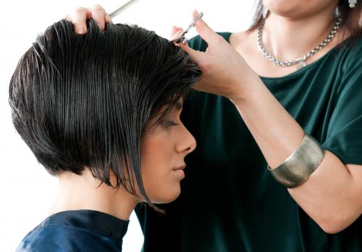 In addition to their managerial tasks, the owner of a hair salon may also cut and style hair.