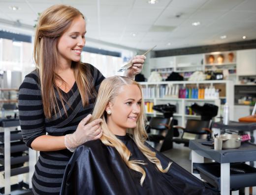 A salon manager hires staff and ensures customers have a good experience.