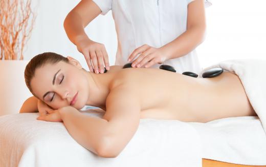 Some massage therapists offer hot stone massages to relax clients.