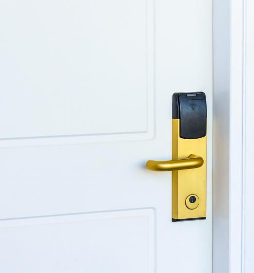 The front desk agent of a hotel usually is in charge of giving room keys to guests.