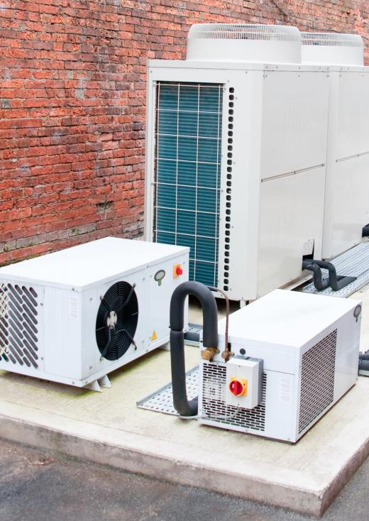 An HVAC engineer learns about air conditioner maintenance.