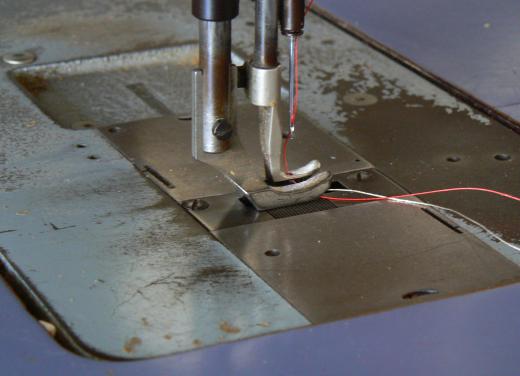 An industrial sewing machine may be used to sew heavy material.