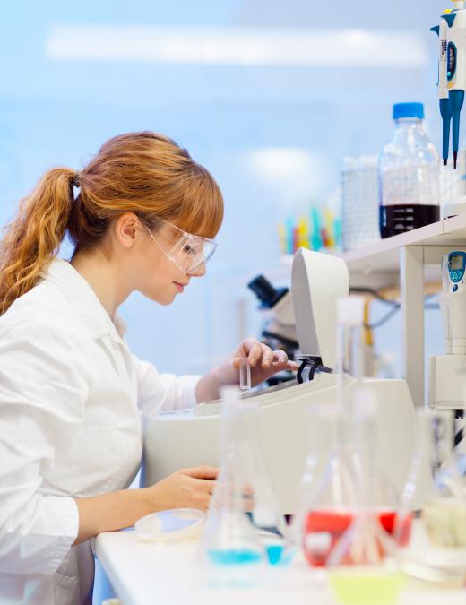 Environmental scientists may analyze samples in a laboratory.