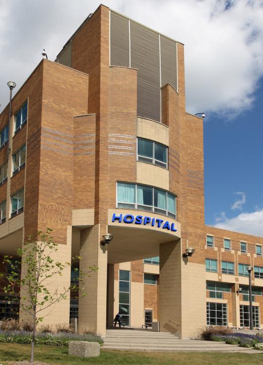 A hospital pharmacist works inside a hospital.