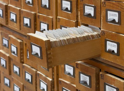 In most libraries, old fashioned card catalogs have been replaced with computer systems.