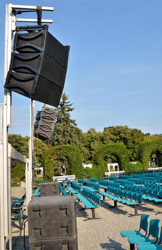 A stagehand may work for an amphitheater or other venue.