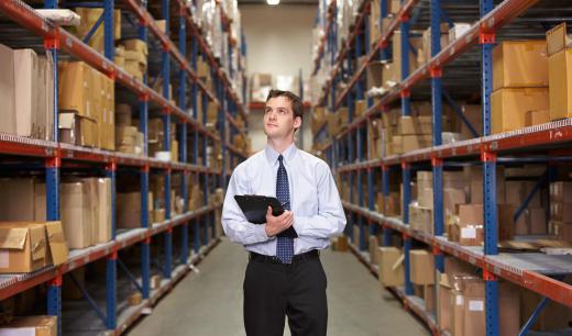 A distribution manager oversees the shipping of goods for a company.