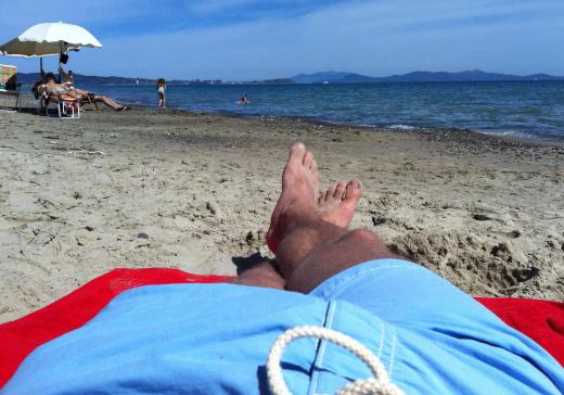 A greensperson may be in charge of handling the sand for a beach scene.