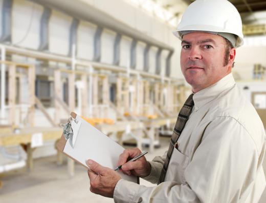 A QA technician reviews products and services to ensure standards.