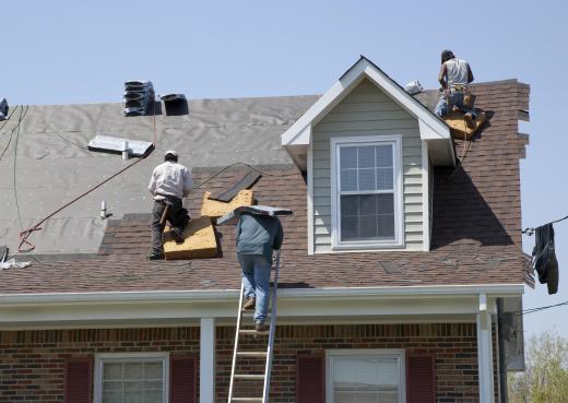 Roofers must have no fear of heights, as most of their work involves moving around atop large residences.