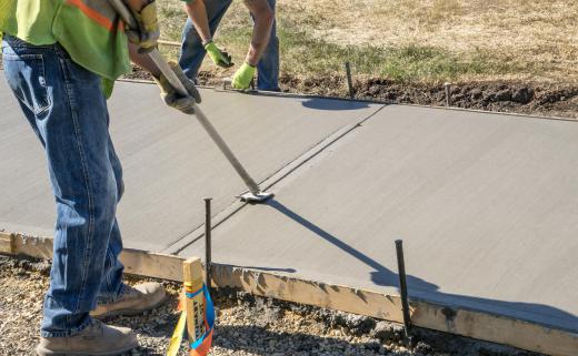 Paving contractors working on municipal projects may lay new sidewalks.