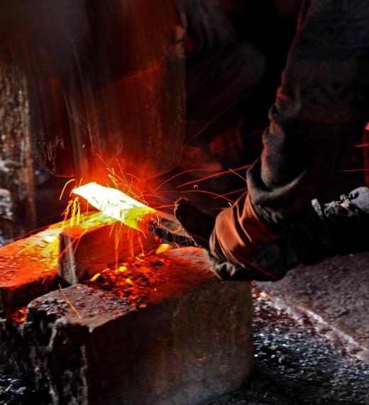 Blacksmiths keep their shops dark so that they can observe the color of heated metals.