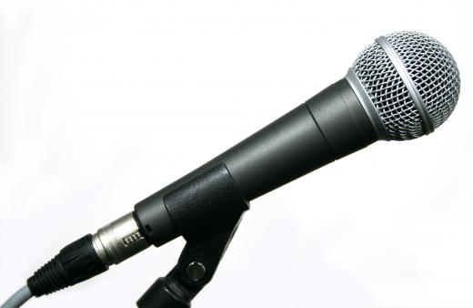 A sound technician typically sets up microphones and makes sure they are working properly.