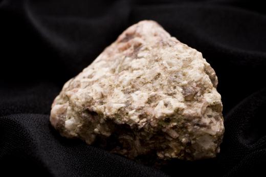 Geologists analyze rock samples from boreholes.