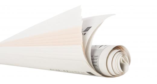 Once a paginator is finished with layout, the newspaper is printed out using a roll of newsprint.