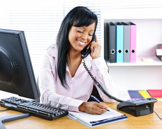 A neat and orderly desk can help administrative assistants track appointments.