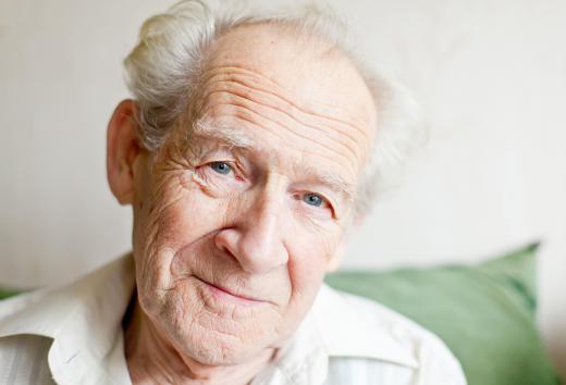 A nursing home activity director works with the elderly.