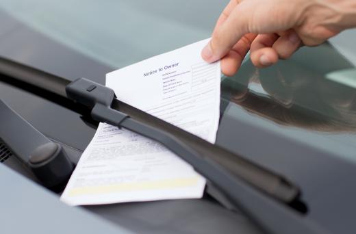 A parking enforcement officer is a type of parking attendant who gives out tickets for illegal parking.