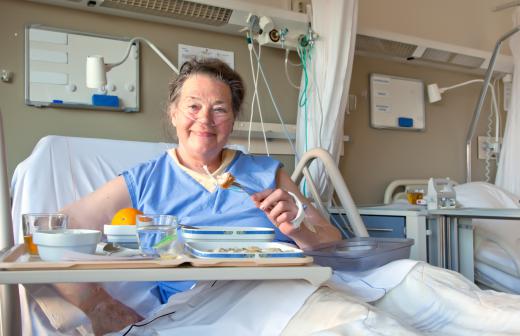 A PACU nurse monitors and cares for patients following surgery.