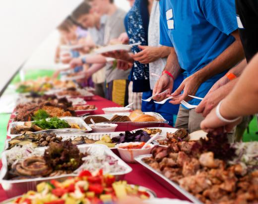 Waitresses may help monitor buffets to make sure there is plenty of food for customers.