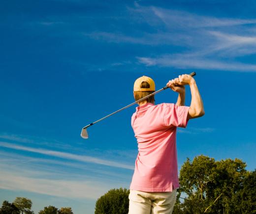 On a golf course, a groundsman's primary responsibility is to maintain the greens and arrange flags and markers for play.