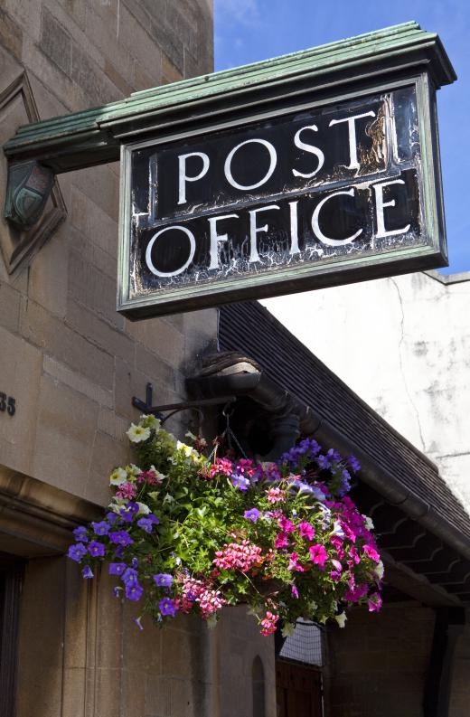 Some commissionaires stand guard at the doors of post offices.