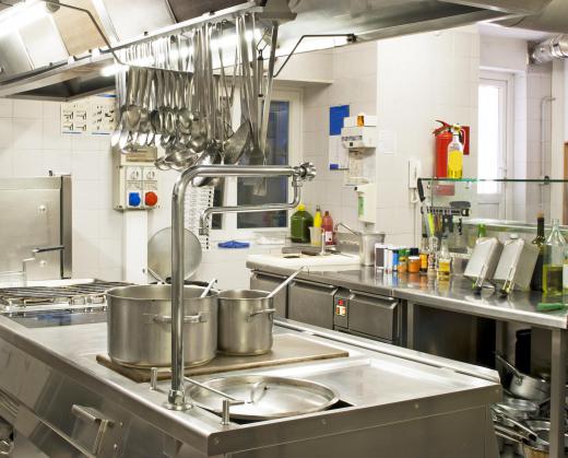 Kitchen supervisors maintain proper health and cleanliness standards.