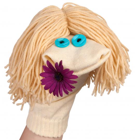 Puppeteers may start out by working with sock puppets.