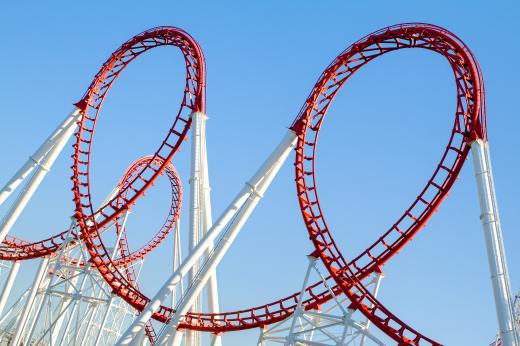 A roller coaster in an amusement park.