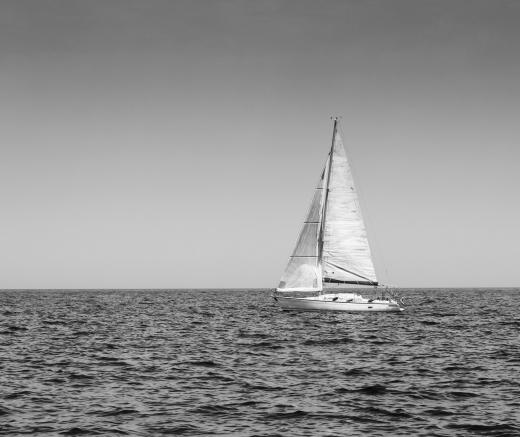 Sailmakers test the sails they have made on the water.