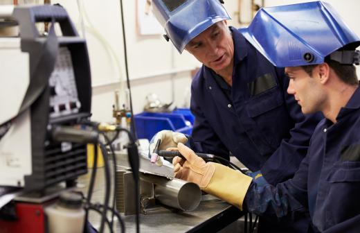 A millwright apprentice will often be trained in welding.