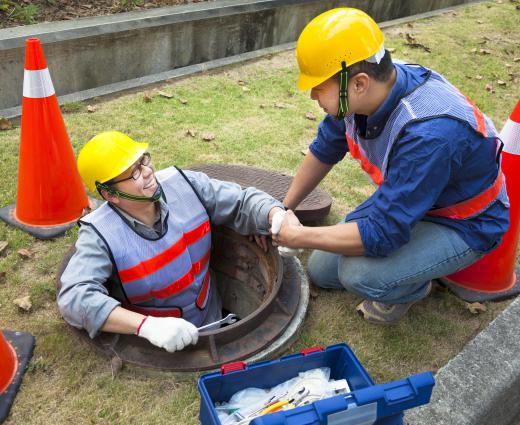 Sewer inspectors must be comfortable working in tight, confined spaces.