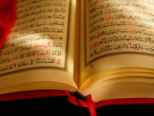 The Qur'an may be used as a reference for a religion research paper.