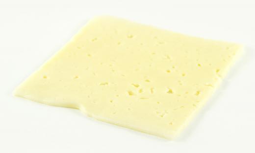 A slice of cow's milk cheese.