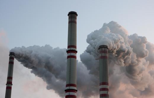 A resource specialist monitors air pollution.