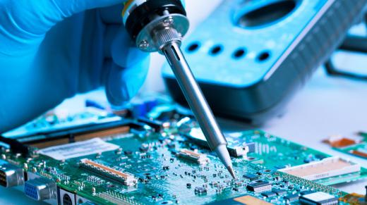 A solderer might be called upon to work on electrical components, such as a motherboard.